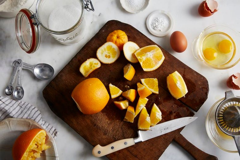 Chopped up oranges on a chopping board